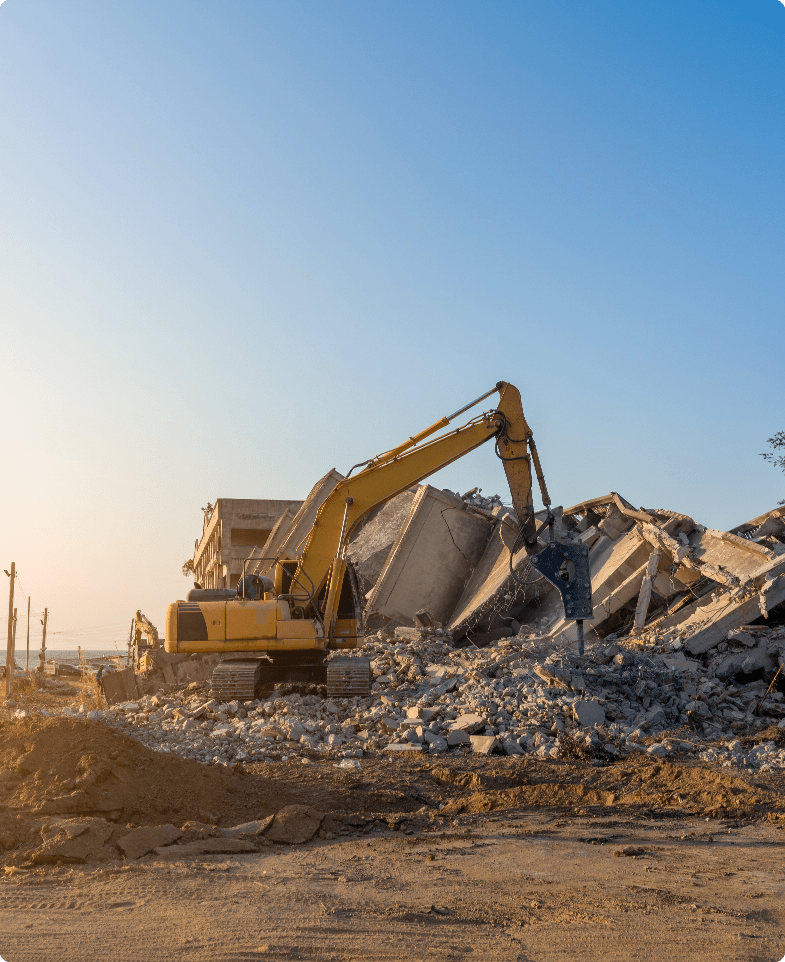 excavator-destroys-building-construction-workers-demolition-building-min