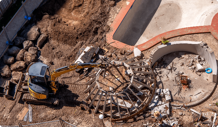 excavator-destroys-old-swimming-pool-2025-01-09-05-23-31-utc-min